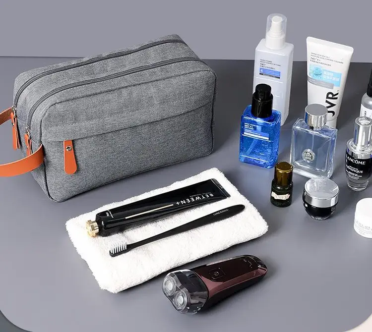 Large multi compartment toiletry bag filled with a complete collection of skincare, cosmetics, and grooming essentials